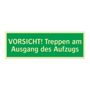 VORSICHT! Treppen am Ausgang des Aufzugs