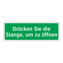 Drücken Sie die Stange, um zu öffnen