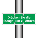 Drücken Sie die Stange, um zu öffnen