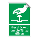 Hier drücken, um die Tür zu öffnen