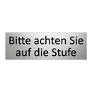 Bitte achten Sie auf die Stufe