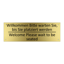 Willkommen Bitte warten Sie, bis /.../ - Welcome Please wait to be seated /.../