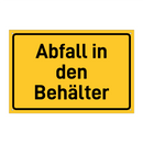 Abfall in den Behälter