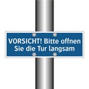 VORSICHT! Bitte offnen Sie die Tur langsam