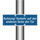Achtung! Verkehr auf der anderen Seite der Tür