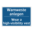 Warnweste anlegen - Wear a high-visibility vest