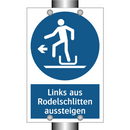 Links aus Rodelschlitten aussteigen