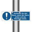 Verlassen Sie den Raum, wenn der Alarm ertönt und das Warnlicht blinkt.