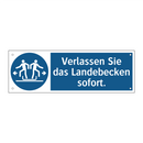 Verlassen Sie das Landebecken sofort.