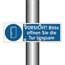 VORSICHT! Bitte offnen Sie die Tur langsam