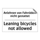 Anlehnen von Fahrrädern nicht /.../ - Leaning bicycles not allowed