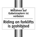 Mitfahren auf Gabelstaplern ist /.../ - Riding on forklifts is prohibited/.../