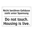 Nicht berühren Gehäuse steht unter /.../ - Do not touch. Housing is live.