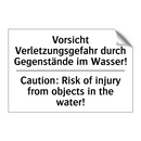 Vorsicht Verletzungsgefahr durch /.../ - Caution: Risk of injury from objects /.../
