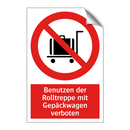 Benutzen der Rolltreppe mit Gepäckwagen verboten