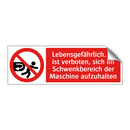 Lebensgefährlich. Es ist verboten, sich im Schwenkbereich der Maschine aufzuhalten