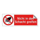 Nicht in den Schacht greifen