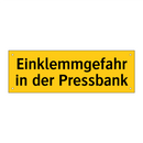 Einklemmgefahr in der Pressbank