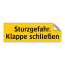 Sturzgefahr. Klappe schließen