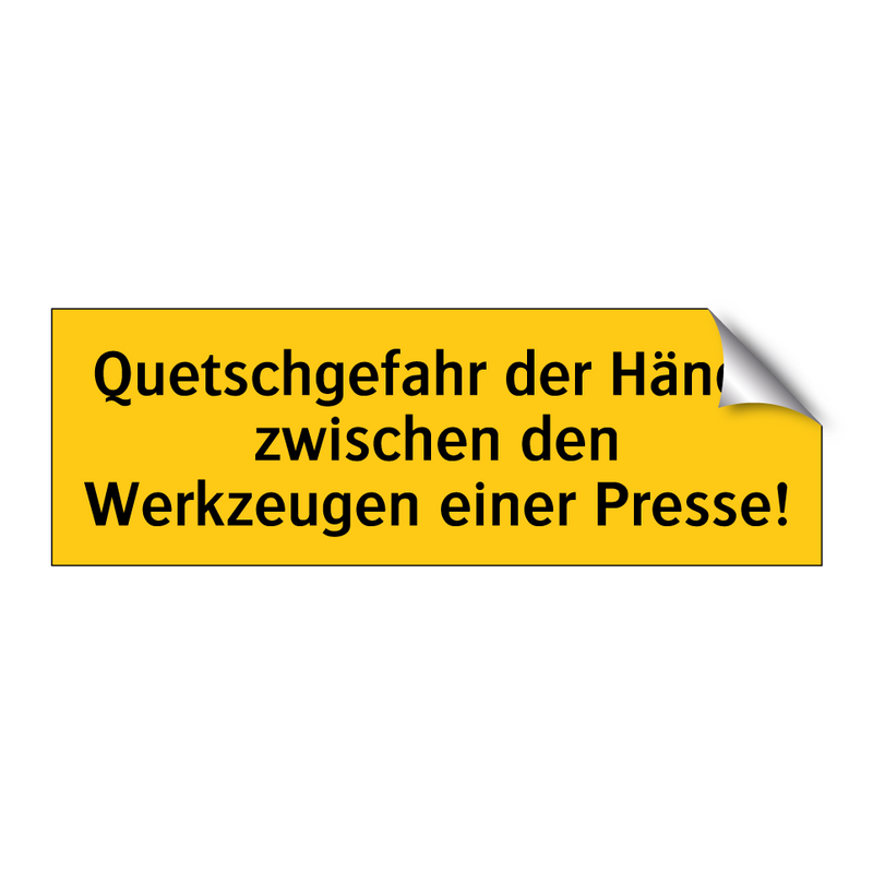 Quetschgefahr der Hände zwischen den Werkzeugen einer Presse!