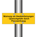 Warnung vor Handverletzungen - Quetschgefahr durch Presswerkzeug