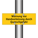 Warnung vor Handverletzung durch Quetschgefahr