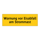 Warnung vor Eisabfall am Strommast
