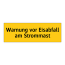 Warnung vor Eisabfall am Strommast