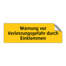 Warnung vor Verletzungsgefahr durch Einklemmen