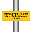 Warnung vor der Gefahr, durch Bodenluken zu stürzen