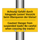 Achtung! Gefahr durch hängende /.../ - Caution! Danger from suspended /.../