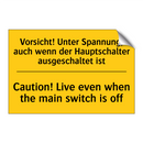 Vorsicht! Unter Spannung, auch /.../ - Caution! Live even when the main /.../