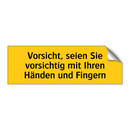 Vorsicht, seien Sie vorsichtig mit Ihren Händen und Fingern