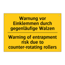 Warnung vor Einklemmen durch gegenläufige /.../ - Warning of entrapment risk due /.../