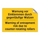Warnung vor Einklemmen durch gegenläufige /.../ - Warning of entrapment risk due /.../