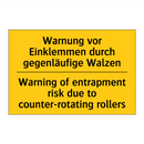 Warnung vor Einklemmen durch gegenläufige /.../ - Warning of entrapment risk due /.../