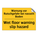 Warnung vor Rutschgefahr bei nassem /.../ - Wet floor warning slip hazard