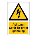 Achtung! Gerät ist unter Spannung.