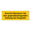 Vorsicht Benutzen Sie den gegenüberliegenden Gehweg bei Eisgefahr
