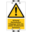 Achtung! Dacharbeiten. Fußgänger bitte die andere Straßenseite benutzen!