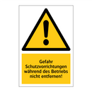 Gefahr Schutzvorrichtungen während des Betriebs nicht entfernen!