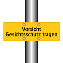 Vorsicht Gesichtsschutz tragen