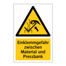 Einklemmgefahr zwischen Material und Pressbank