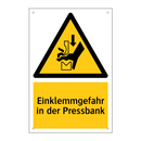 Einklemmgefahr in der Pressbank