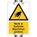 Nicht in laufende Maschinen greifen!
