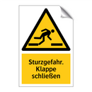 Sturzgefahr. Klappe schließen