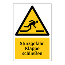 Sturzgefahr. Klappe schließen