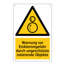 Warnung vor Einklemmgefahr durch ungeschützte rotierende Objekte
