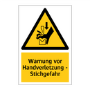 Warnung vor Handverletzung - Stichgefahr