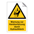 Warnung vor Handverletzung durch Hydraulikleck